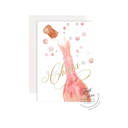celebration greeting card featuring painted champagne bottle with cork popping and bubbles in the background and elegant script Cheers across the front