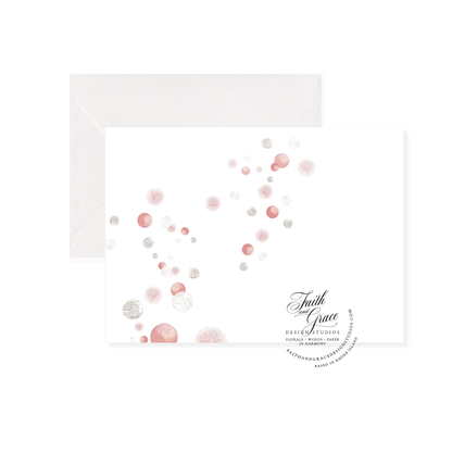 inside of the card features painted champagne bubbles across the inside background