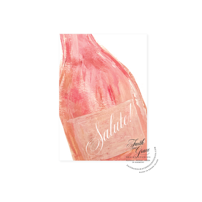 Salute in white Script on pink champagne botttle
